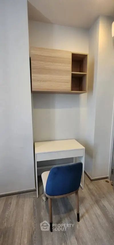 Modern study nook with sleek desk and chair, perfect for productivity.