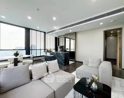Luxurious modern living room with panoramic city views and elegant furnishings.