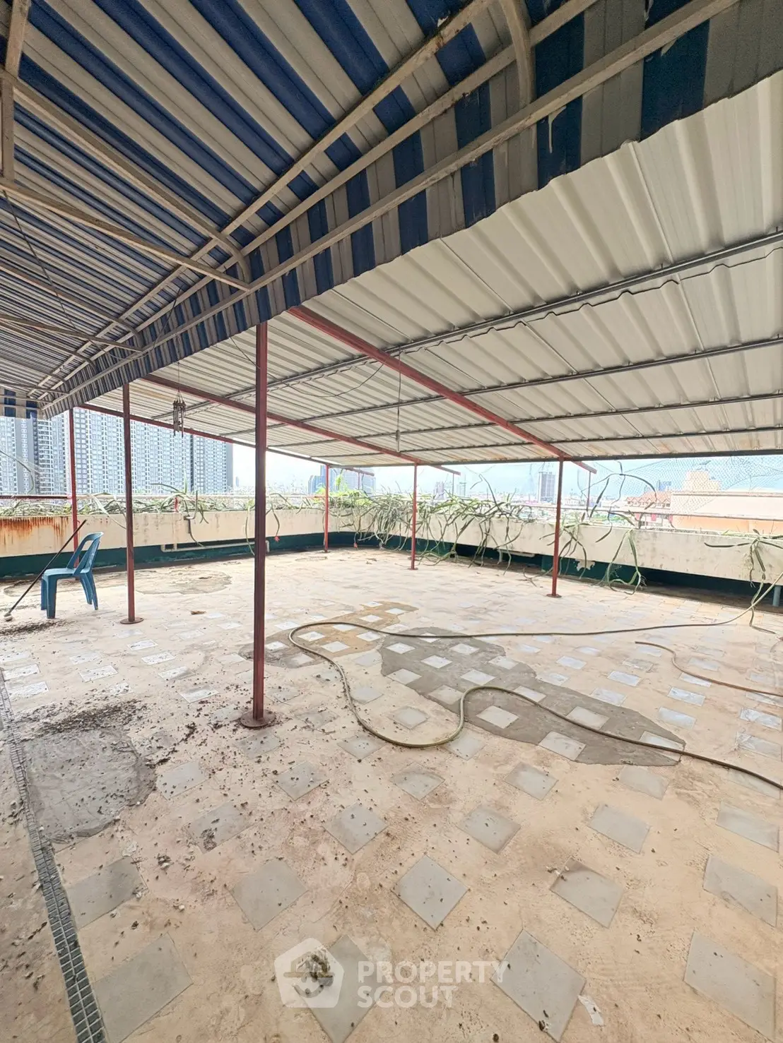 Spacious rooftop area with potential for customization and city views.
