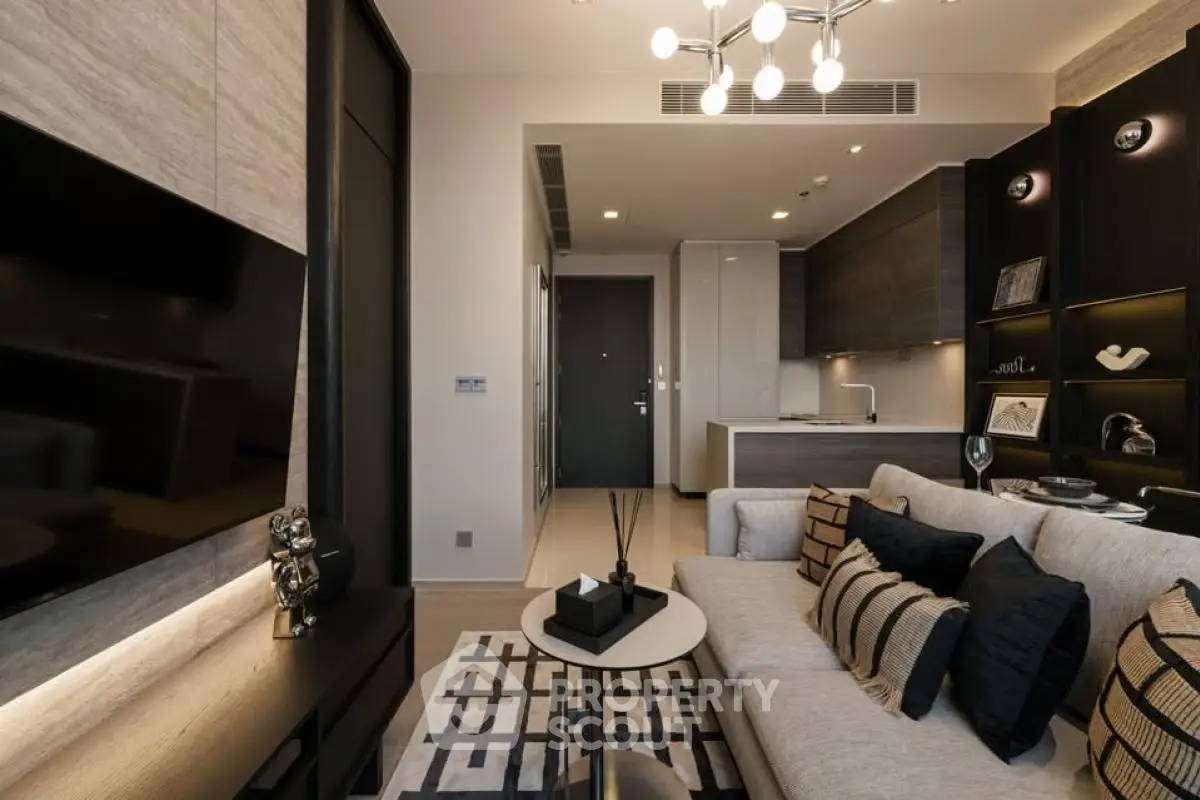 Modern living room with stylish decor and open kitchen layout