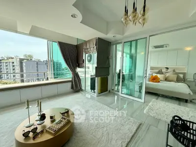 Luxurious modern living room with large windows and elegant decor