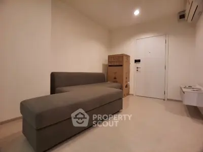 Cozy minimalist living room with modern sofa and sleek design