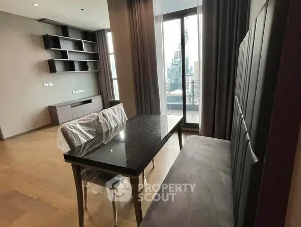 Modern dining area with city view from balcony in luxury apartment