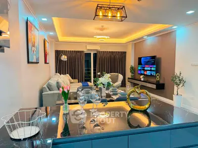 Luxurious modern living room with elegant decor and ambient lighting