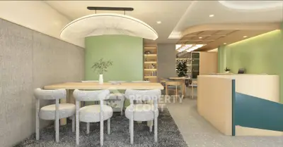 Modern dining area with stylish lighting and contemporary furniture in a chic open layout.