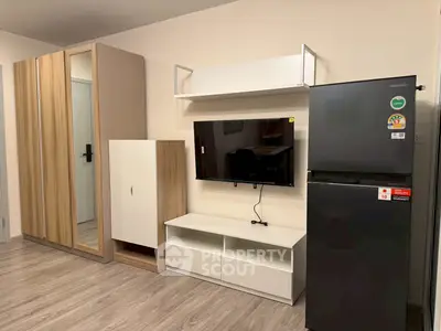 Modern apartment interior with sleek furniture and appliances