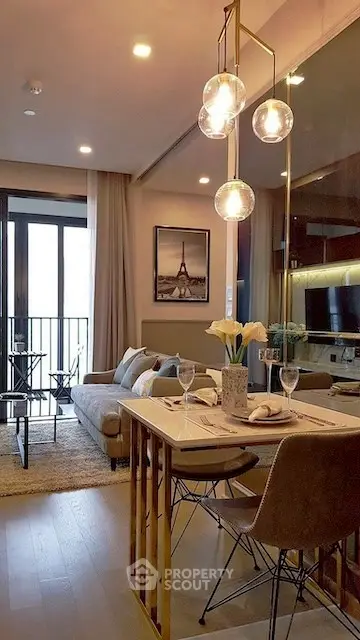 Chic modern living room with elegant dining area and stylish lighting