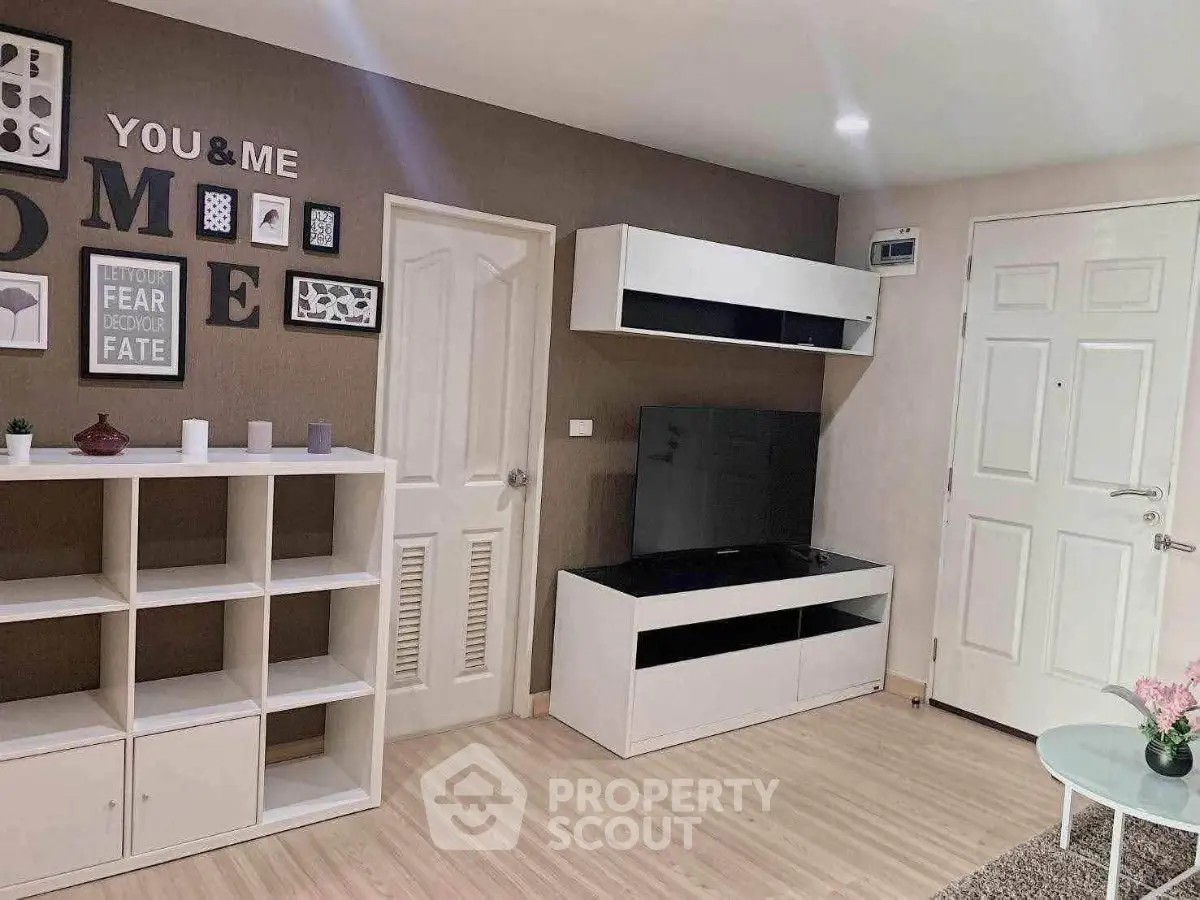 Modern living room with stylish decor and entertainment center