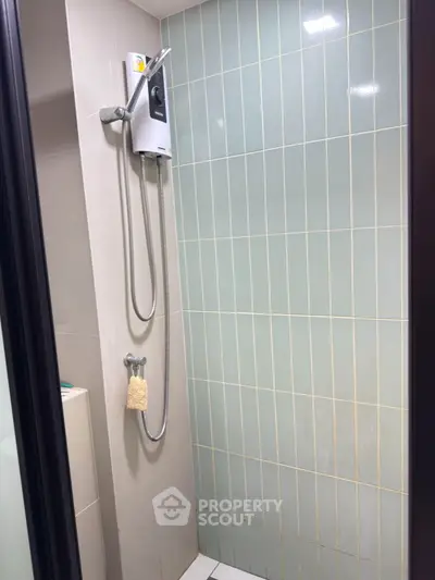 Modern bathroom with sleek shower design and contemporary tiles