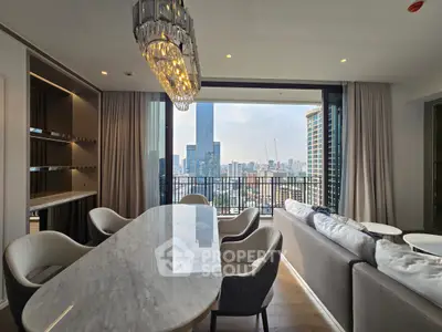 Luxurious living room with stunning city view and elegant chandelier
