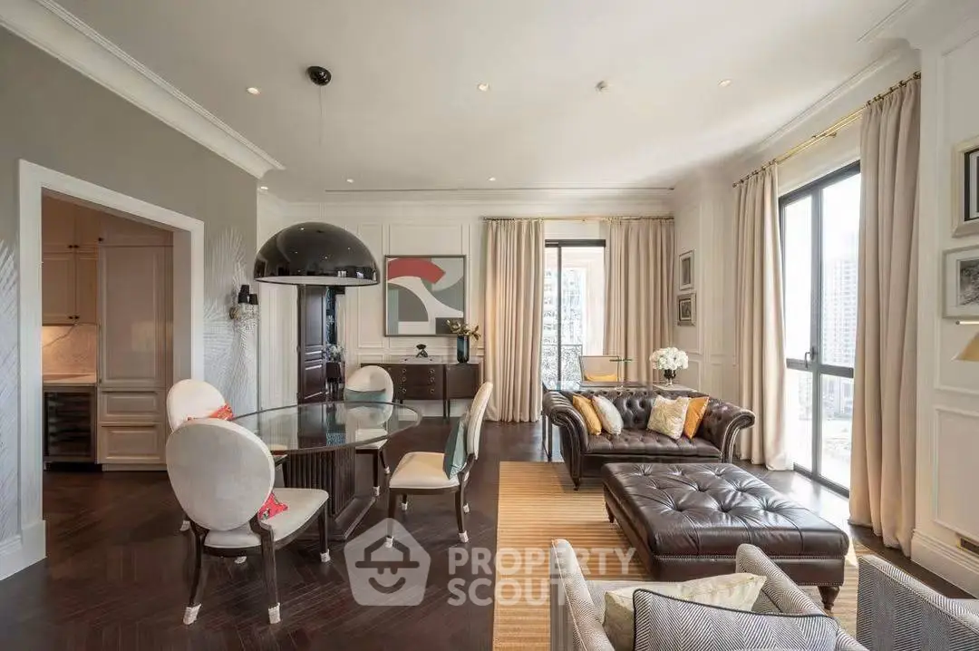 Luxurious living room with elegant decor and large windows offering city views