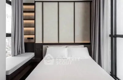 Modern bedroom with large windows and elegant design