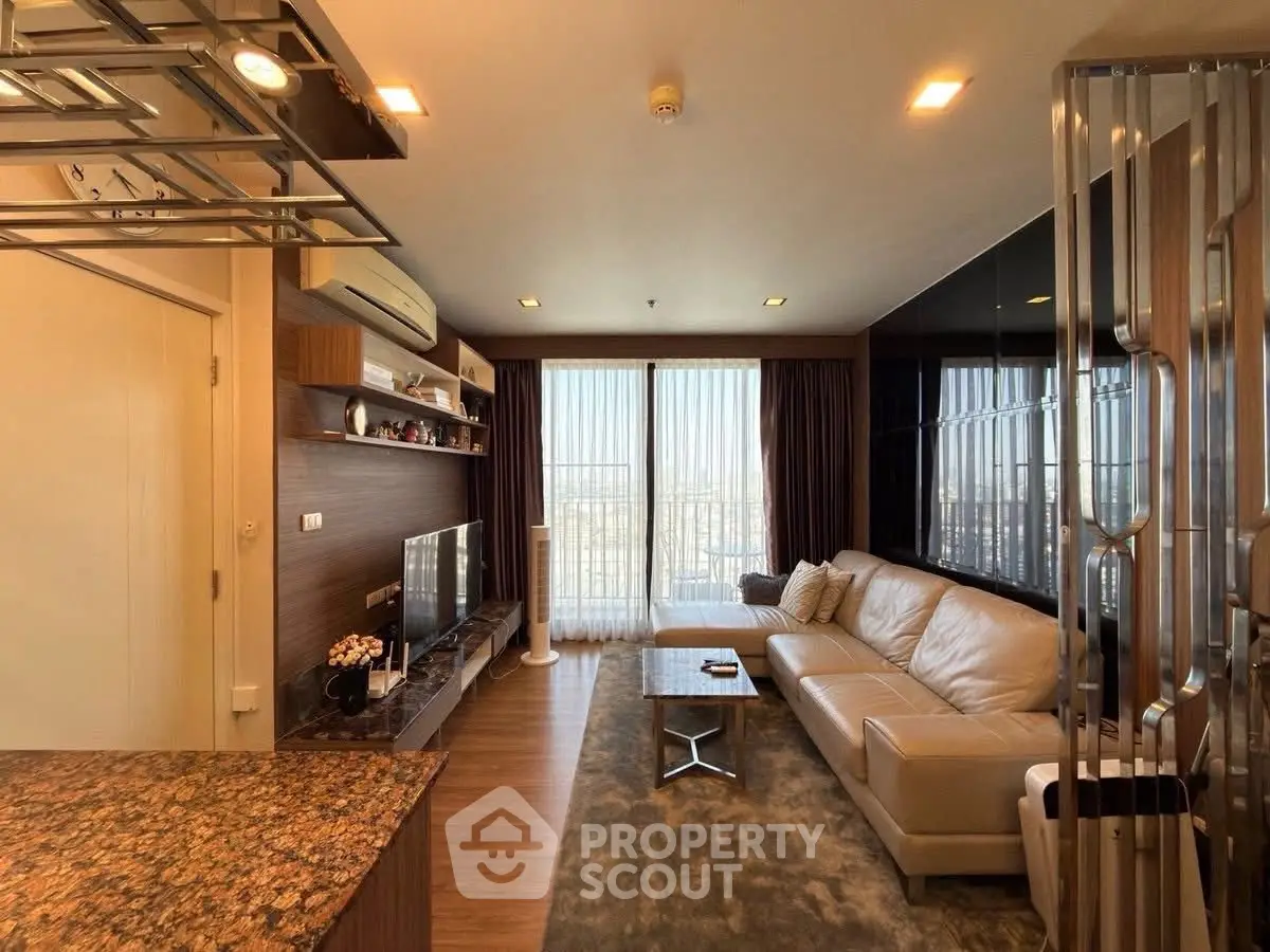 Stylish modern living room with large windows and elegant decor