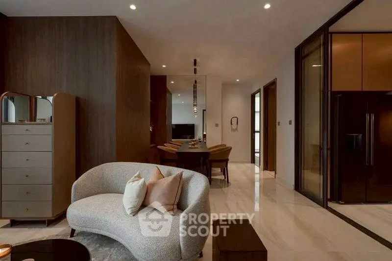 Luxurious modern living room with elegant furniture and open layout, perfect for sophisticated urban living.
