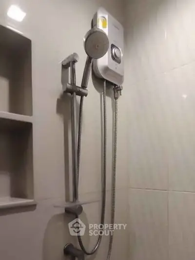 Modern bathroom shower with sleek design and built-in shelving