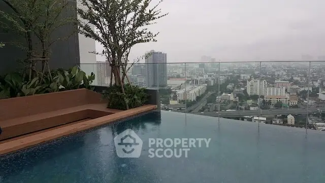 Stunning rooftop pool with panoramic city views, perfect for luxury urban living.