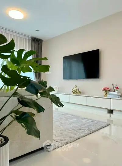 Modern living room with sleek TV setup and stylish decor