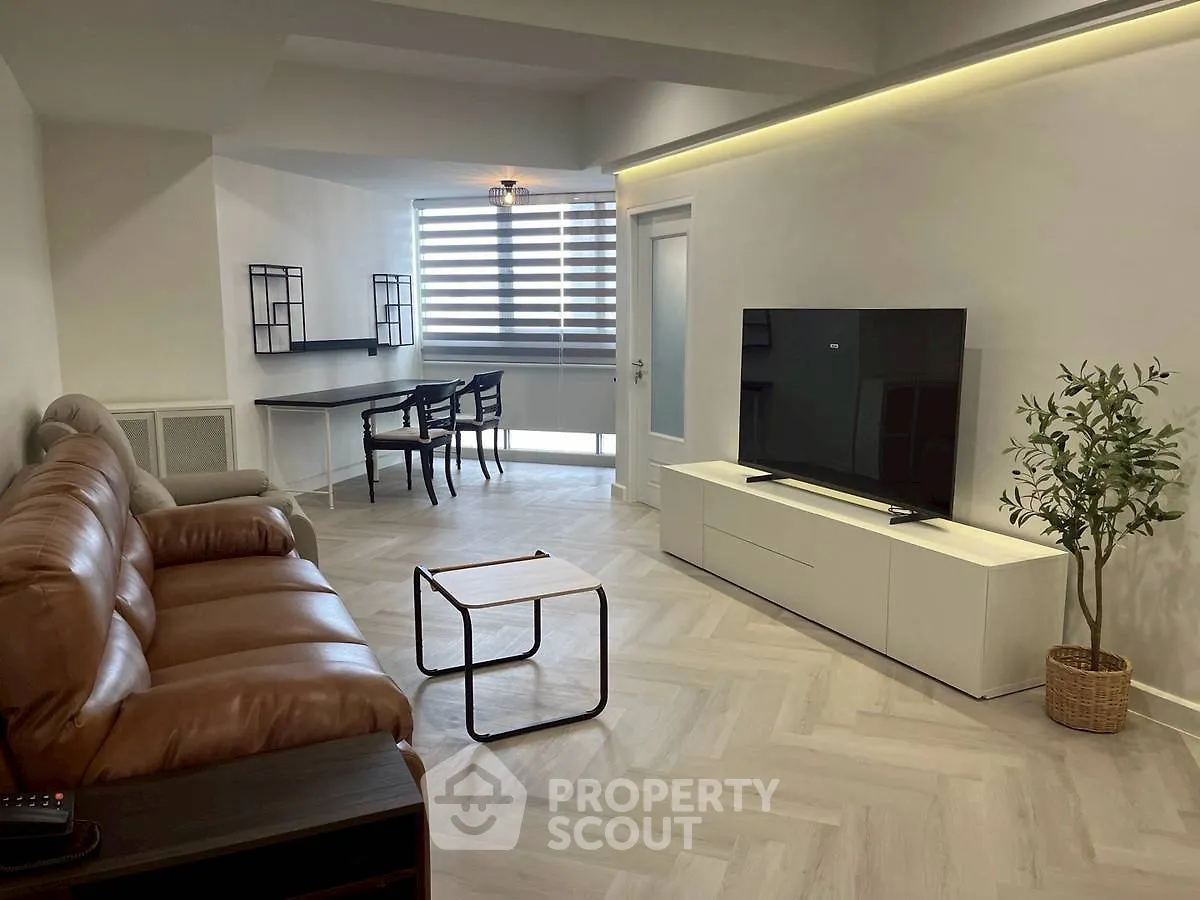 Modern living room with sleek furniture and natural light