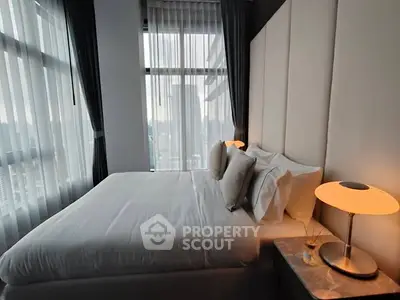 Luxurious bedroom with city view and elegant lighting