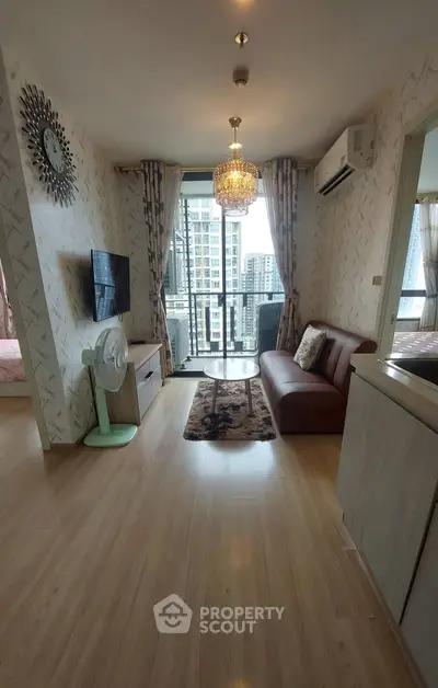 Chic urban living room with balcony view in modern apartment
