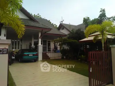 Charming suburban home with carport and lush garden, perfect for family living.