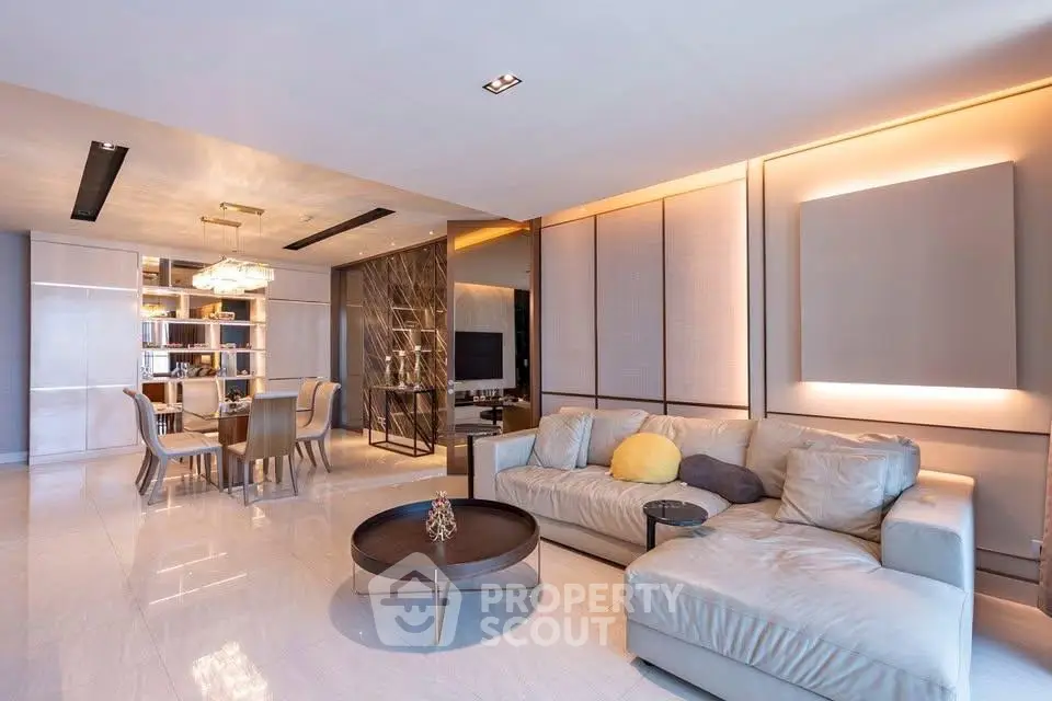 Luxurious modern living room with elegant decor and spacious seating area.