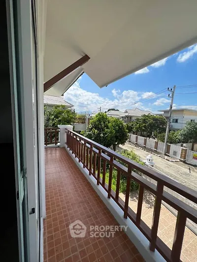 Spacious balcony with scenic view in a modern residential area, perfect for relaxation and outdoor enjoyment.
