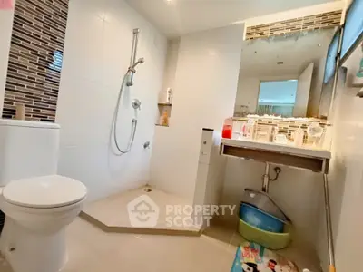 Modern bathroom with sleek shower and stylish tiles