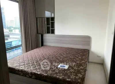 Modern bedroom with city view and stylish decor