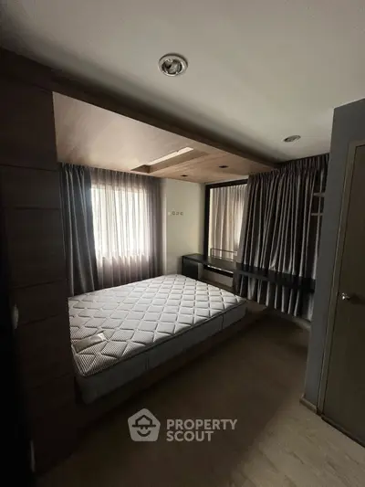 Cozy bedroom with natural light and modern design
