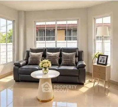 Bright and cozy living room with modern sofa and elegant decor
