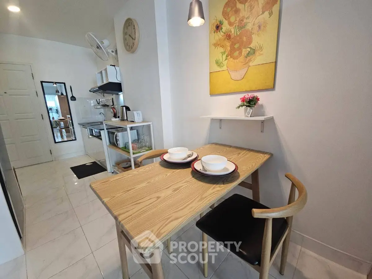 Charming kitchen with modern decor and cozy dining area