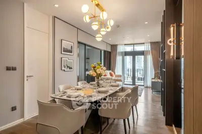 Luxurious dining area with elegant lighting and city view, perfect for modern living.