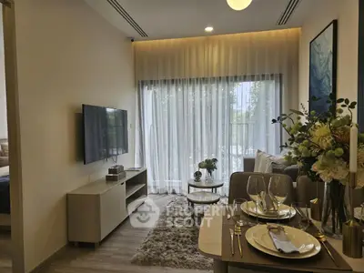 Modern living room with elegant dining setup and natural light