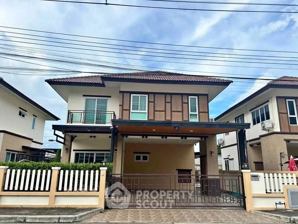 Charming two-story house with modern design and spacious driveway in a serene neighborhood.