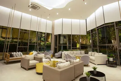 Luxurious modern living room with high ceilings and stylish furniture