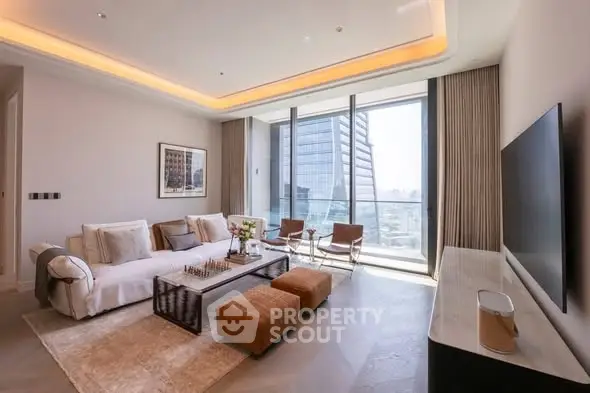 Luxurious modern living room with floor-to-ceiling windows and stunning city view.