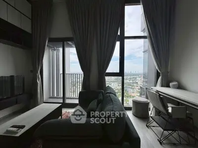 Modern living room with city view and balcony access