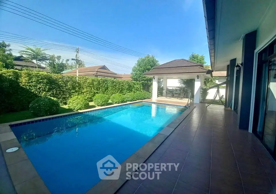 Luxurious villa with private pool and lush garden, perfect for relaxation and entertaining.