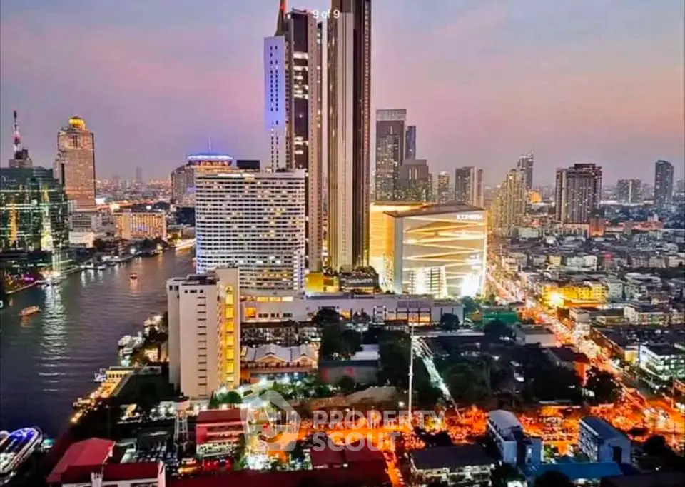 Stunning cityscape view of a vibrant urban skyline at dusk with illuminated skyscrapers and riverfront.
