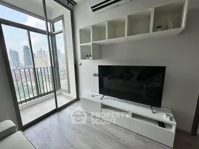 Modern living room with balcony view in high-rise apartment