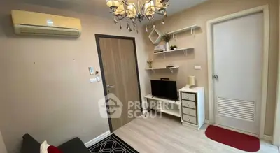 Cozy living room with modern decor and air conditioning in a stylish apartment.