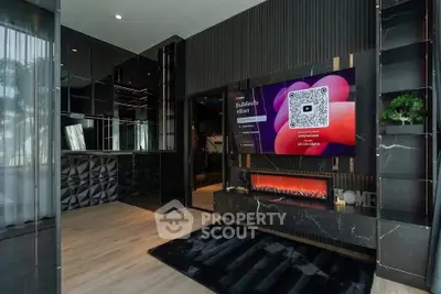Luxurious modern living room with sleek black decor and stylish fireplace