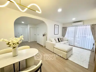 Modern living room with elegant decor and natural light