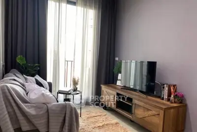 Cozy living room with modern decor and natural light