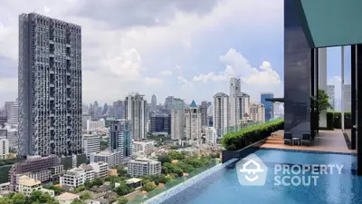 Stunning rooftop pool with breathtaking city skyline view in luxury high-rise building.