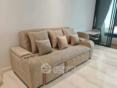 Modern living room with stylish beige sofa and elegant decor