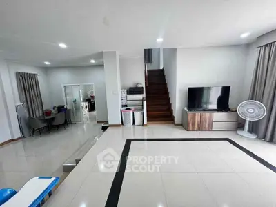 Spacious modern living room with sleek design and open layout