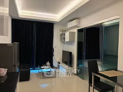 Modern living room with sleek design and glass partition in stylish apartment