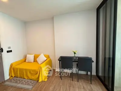Cozy living room with yellow sofa and dining table, modern interior design
